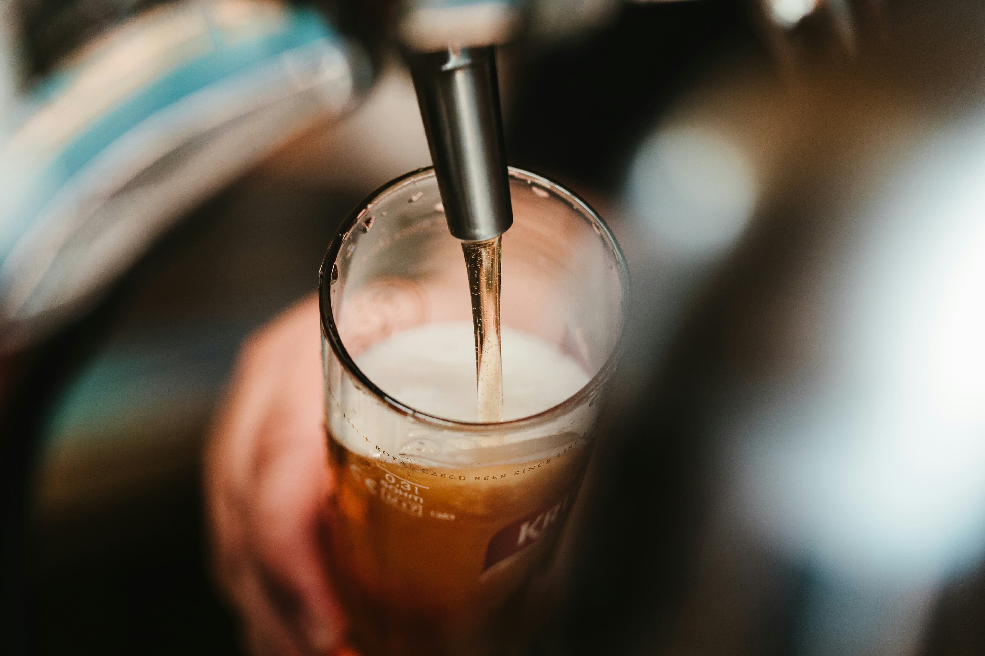 Beer being poured from a tap
