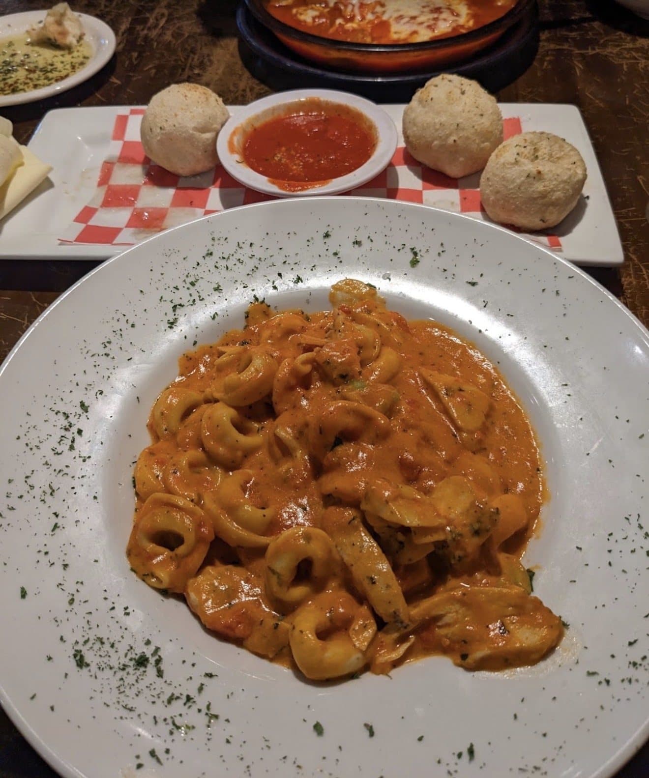 Tortellini in a creamy tomato sauce with Garlic Basil Cheese Rolls at Napoli's, Lincoln